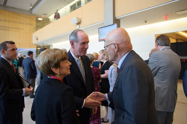 Maxine Morse, and her husband, Leonard Morse, MD, talk with Chancellor Michael F. Collins.