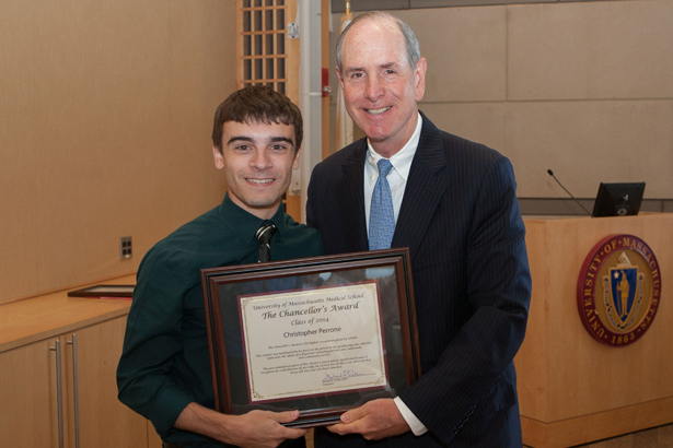 Chancellor Michael F. Collins presents the Chancellor’s Award to Christopher Perrone.
