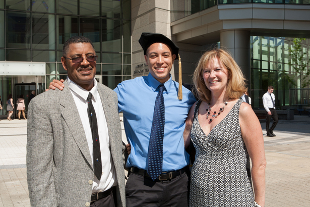 SOM graduate Michael Richardson (center) with his parents