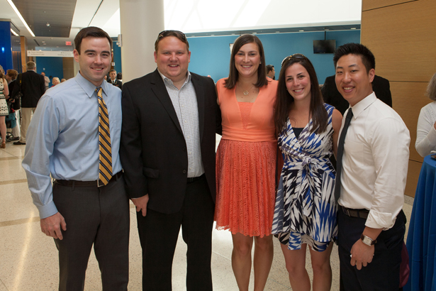 Grads and family members (from left) Jefferson Barrett, SOM ‘14, Brad Horth, Anne Antonellis, SOM ’14, Claire Horth and Daniel Choy, SOM ’14