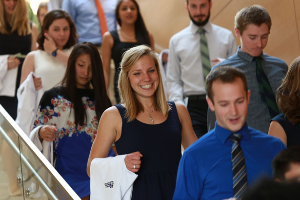 The first-year medical students are on their way into the White Coat Ceremony.