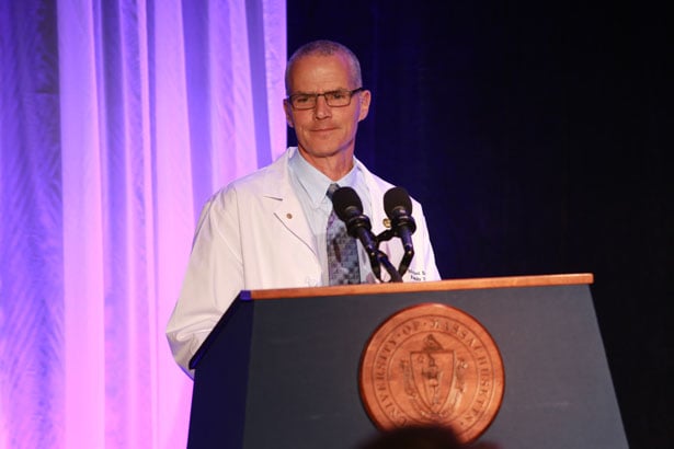 Michael Ennis, MD, co-director of the Learning Communities, welcomes guests to the White Coat Ceremony.