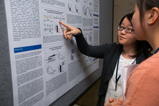 Sijia Wu, a GSBS student in the Brudnick Neuropsychiatric Research Institute, talks about a poster at the 19th Annual Basic Research/GSBS Retreat.