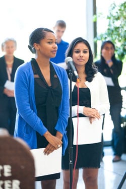 Medical students Solange Bayard, left, and Jasmine Khubchandani, creators of the visual arts exhibit on display in the Lamar Soutter Library through Sept. 26, are pictured here at the rally for peace and justice held recently at UMass Medical School.