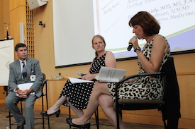 Jennifer Reidy, MD, (right) reads from Being Mortal: Medicine and What Matters in the End with co-discussants Patrick Muldoon and Suzana Makowski, MD, at the launch of the 2015 Campus Diversity Read.