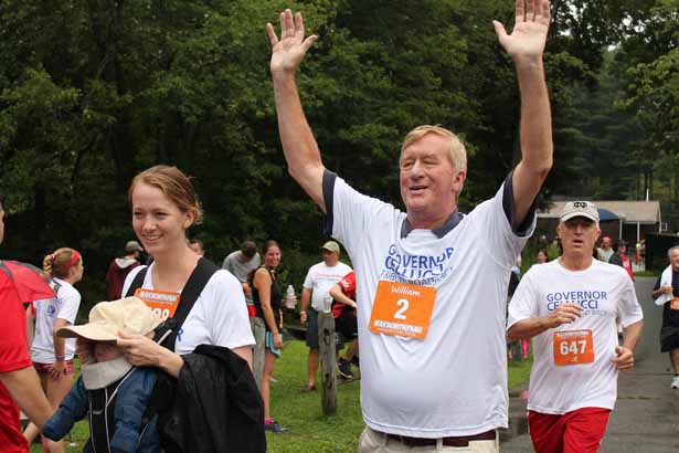Former Gov. William Weld and daughter Mary Weld finish the race.