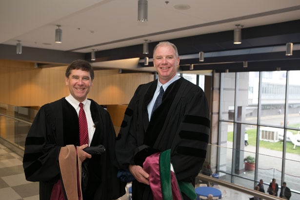 Patrick Muldoon and Eric Dickson, MD, represented UMass Memorial Health Care during Commencement.
