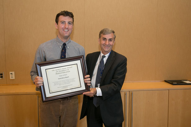 Michael Kneeland, MD, presents Daniel Maselli with the Sarah L. Stone Memorial Award