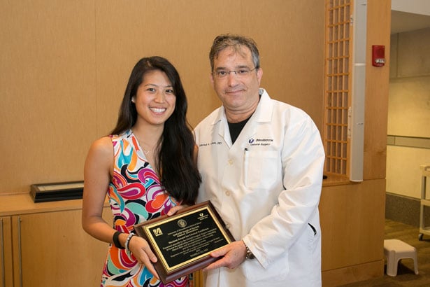 Pamela Lu received the UMass Surgical Society Award for Excellence in Student Clinical Performance from Mitchell Cahan, MD.