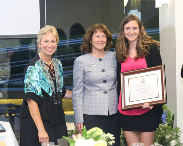 Dean Vitello and Cynthia French (center), present the Outstanding Nurse Practitioner in Critical Care Award to Shenley Meyer.