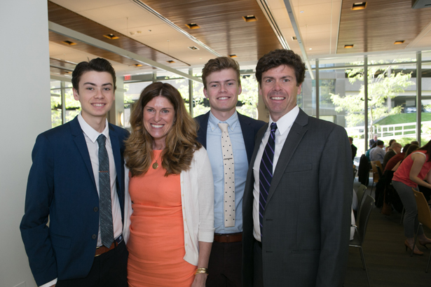 GSN graduate and class speaker Michele Griswold with (from left) sons Eli and Max and husband Matthew