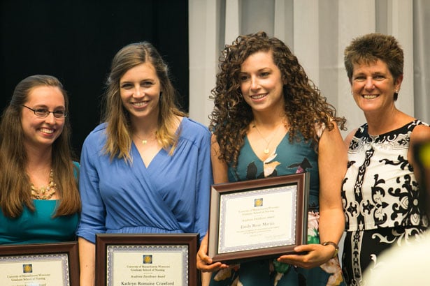 (from left) Academic Excellence Award winners Melanie Faust, Kathryn Crawford and Emily Martin with Dr. Terrill