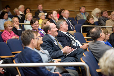 David Nicholson (center) asks a question during the annual meeting of the Hudson Hoagland Society.