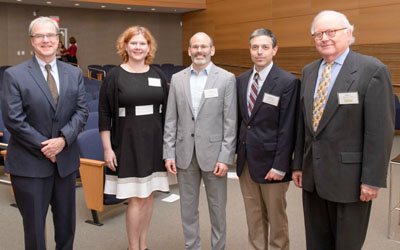 From left are Dean Terence Flotte; panelists Amy Wachholtz, PhD; Judson Brewer, MD, PhD; and Andrew Tapper, PhD; and Thoru Pederson, PhD.