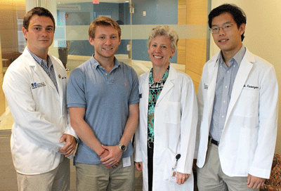 From left, medical students Alexander Boardman, Jeff Larnard,  and Mark Fusunyan with nurse practitioner Beth Terhune.