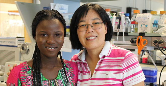 Solange Fine Amedetowou (left), is pictured with Aroian lab faculty member Yan Hu, PhD.