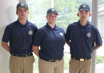 (from left) Summer Youth Police Academy cadets Timothy Joel Rosado, Stasia Robichaud and Alexander Stamatelatos