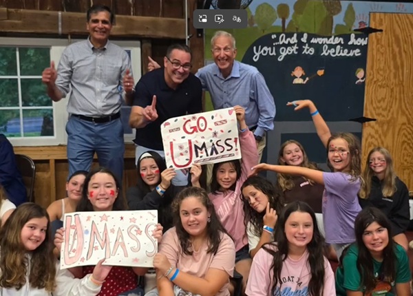 Drs. Malkani, Brehm, and Haas pictured with campers at the Barton Camp