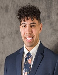 Male medical resident smiling