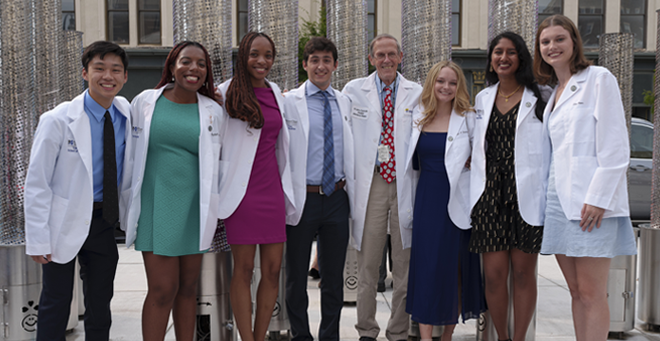 Laurel House mentor William &ldquot;Jerry&rdquot; Durbin, MD, with first-year medical students
