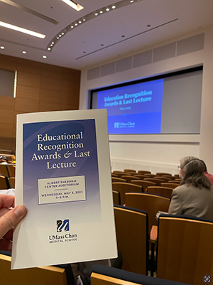 a picture of the program for the education recognition awards in the lecture hall