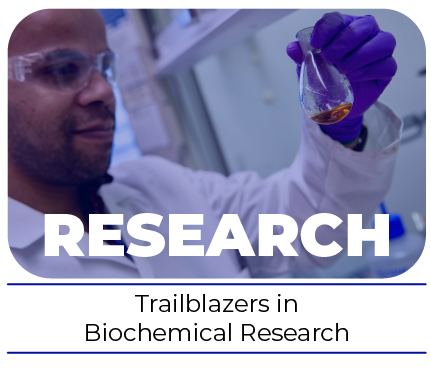 photo of a scientist holding a round bottom flask above the text trailblazers in biochemical research