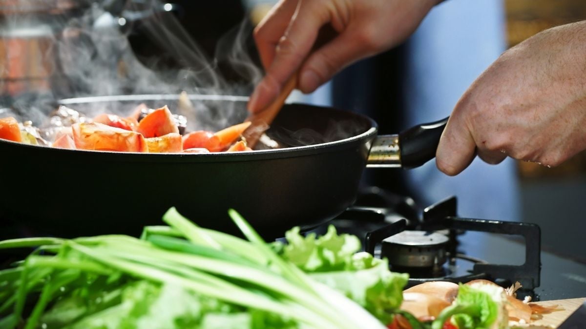 Your non-stick frying pan could be making you FAT - as chemicals found in the ut