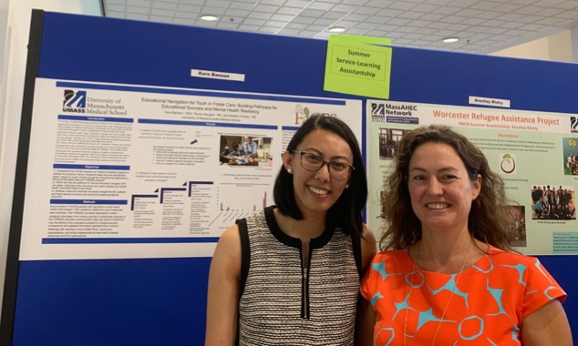 Kara Banson and Dr. Morgan smile for the camera at the UMMS poster session