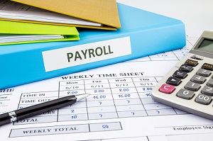 bigstock-Calculate-Payroll-For-Employee-resized-79269223.jpg