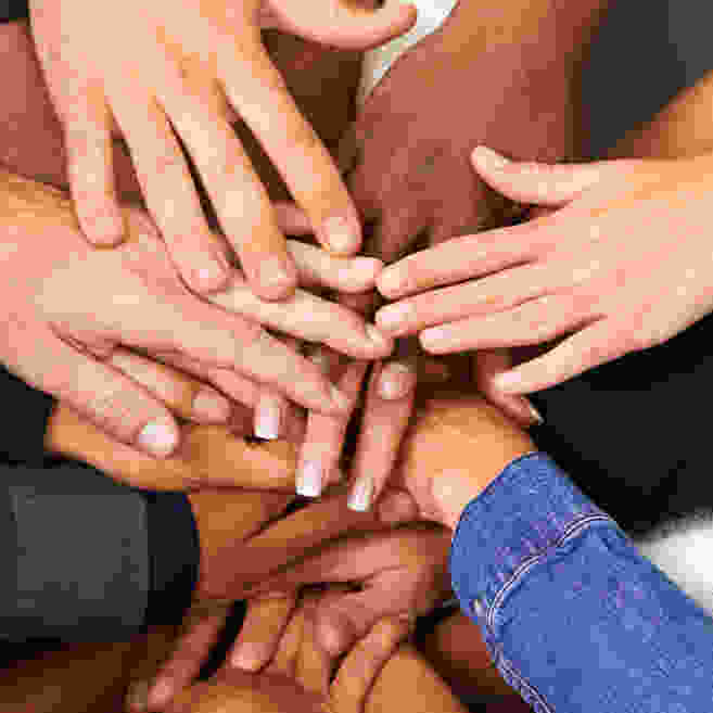 Diversity at UMMS - image of hands of all colors in circle