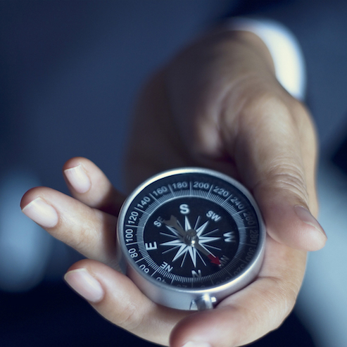  Mission - photo of business man's hand holding a compass