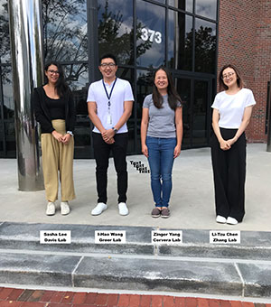 4 students with their awards