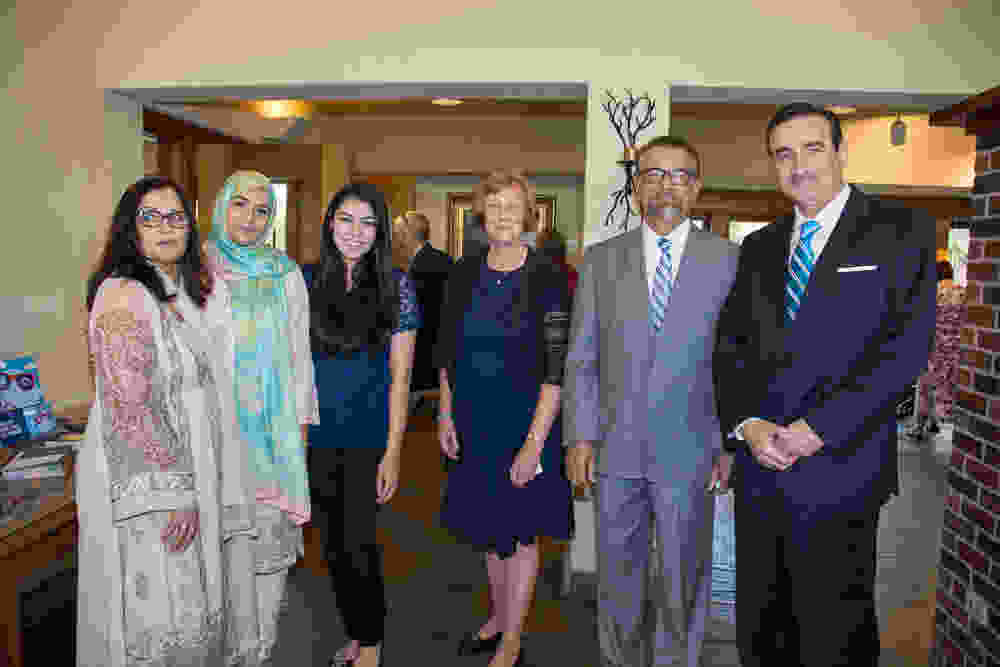 Dr. Hussain and family and Dr. Karellas