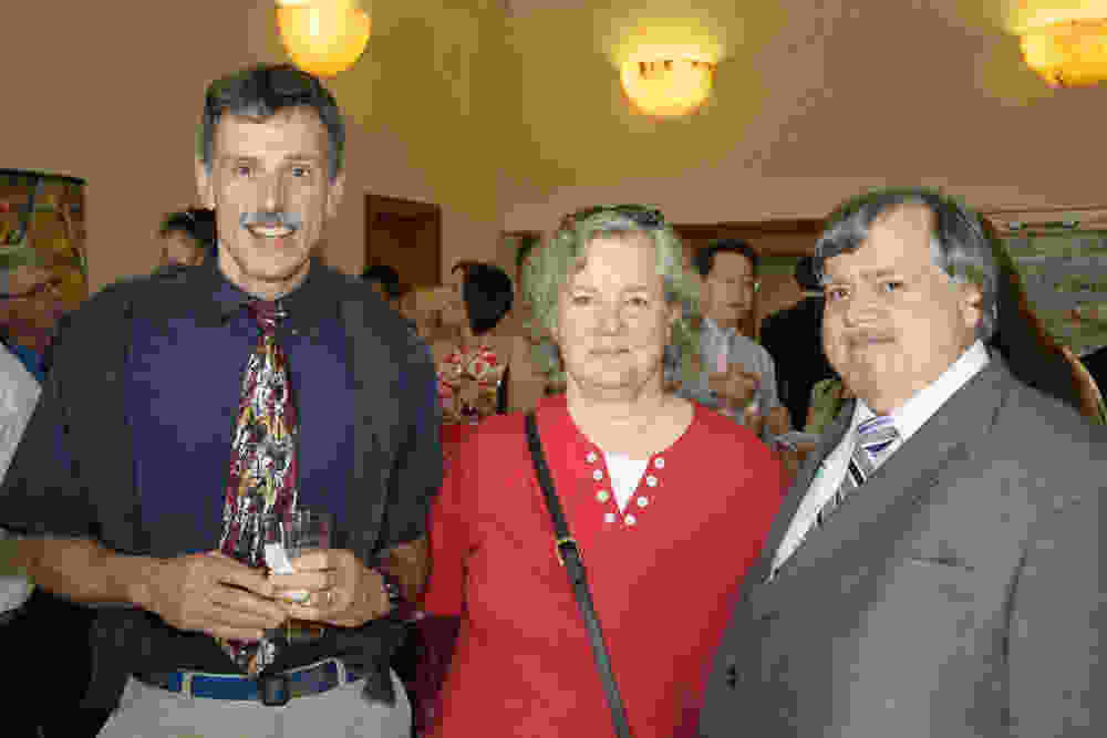 Dr.s Robert Licho and Scott Britz-Cunningham and wife