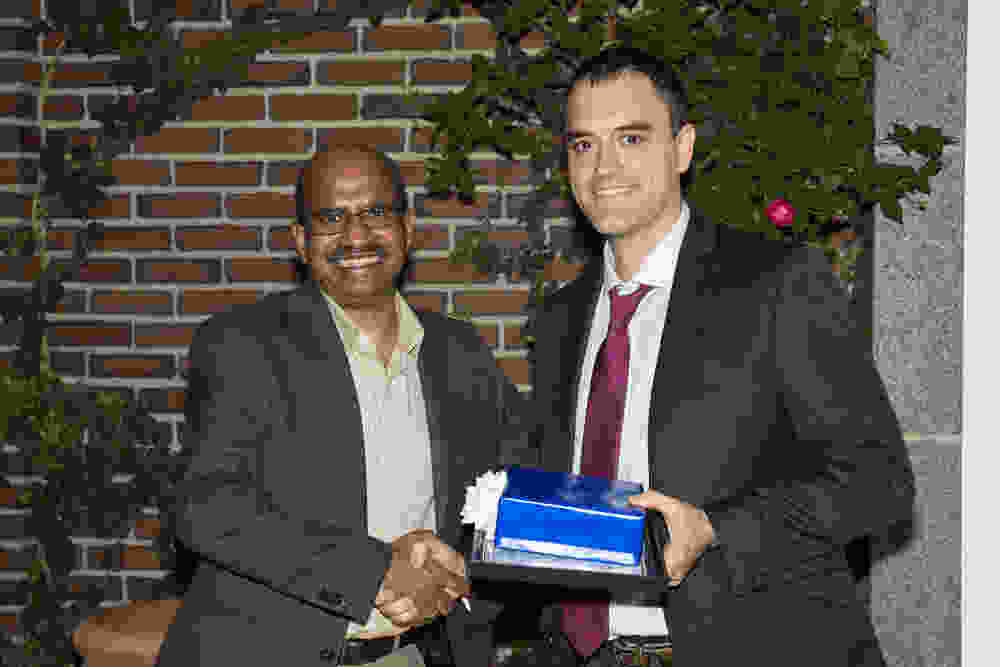 Dr. Dundamadappa congratulates Neuroradiology Fellow Dr. Adam Ulano