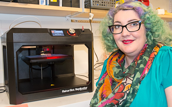 Yasmin Carter, PhD with 3D printer