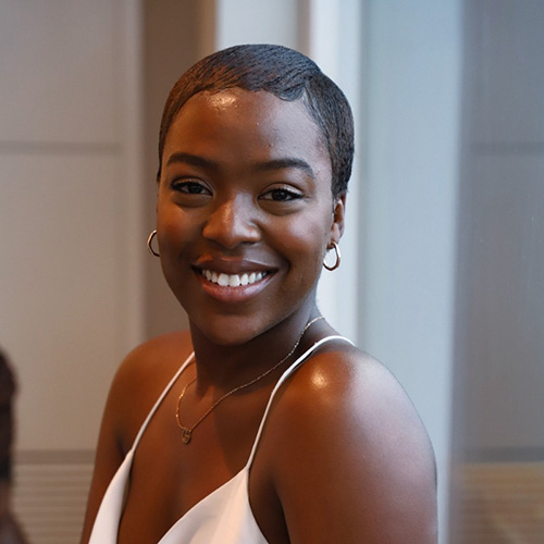 black woman with micro short hair