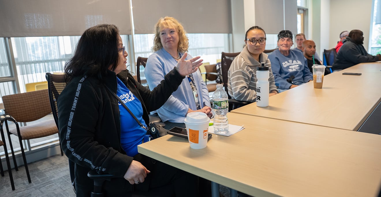 From left: Yara Hentz, director of the Project Management Office at ForHealth Consulting; Jackie McGravey, assistant vice chancellor of people development and wellness; and Nancy Hu, a clinical research coordinator in the Department of Psychiatry & Behavioral Sciences, lead a resume building workshop and mock interview for Jeremiah&rsquo;s Inn during the UMass Chan Cares Days of Service in May 2025