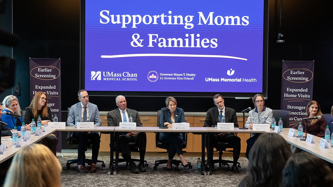 Gov. Maura Healey (center) was joined by (from left) Amy Rosenthal, Executive Office of Health and Human Services undersecretary of health; Emily Bailey, commissioner of the Massachusetts Department of Mental Health; Robbie Goldstein, MD, PhD, commissioner of the Massachusetts Department of Public Health; Eric Dickson, MD, president and chief executive officer of UMass Memorial Health; Chancellor David D. McManus; Tiffany A. Moore Simas, MD&rsquo;00, MPH, MEd, MHCM; and Nancy Byatt, DO, MS&rsquo;15, MBA, and several other participants at the roundtable at UMass Chan Medical School