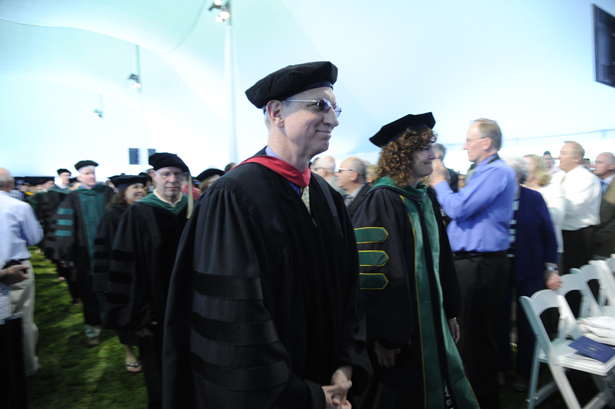 W. Peter Metz, MD, and Diane Blake, MD, walk with other learning community mentors in the processional.