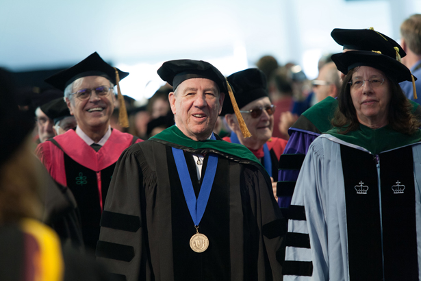 John Mordes, PhD, Richard Glew, MD, and Jennifer Daly, MD, walk into the tent.