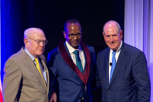 George F. Booth II, Brian Lewis, PhD, and Chancellor Collins