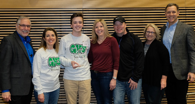 Brain Bee winner Colin Wood (third from left) with (from left) Sheldon Benjamin, MD; Grafton High School teacher Michelle Bailey; Colin’s parents, Tracy and Robert Wood; and Shirley and Michael Sheridan