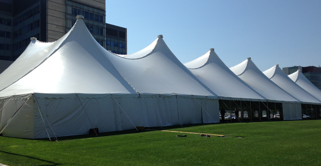 the Commencement tent on the campus green at UMass Medical School