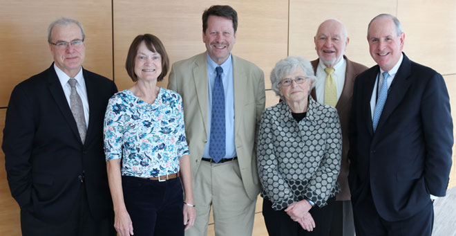 Pictured here at center, Dr. Califf is welcomed to UMMS by (from left) Terence R. Flotte, MD, the Celia and Isaac Haidak Professor of Medical Education, executive deputy chancellor, provost and dean of the School of Medicine; Cathy Stavroff; Catarina Kiefe, MD, PhD, the Melvin S. and Sandra L. Cutler Chair in Biomedical Research and chair and professor of qualitative health sciences; Melvin S. Cutler; and Chancellor Michael F. Collins.