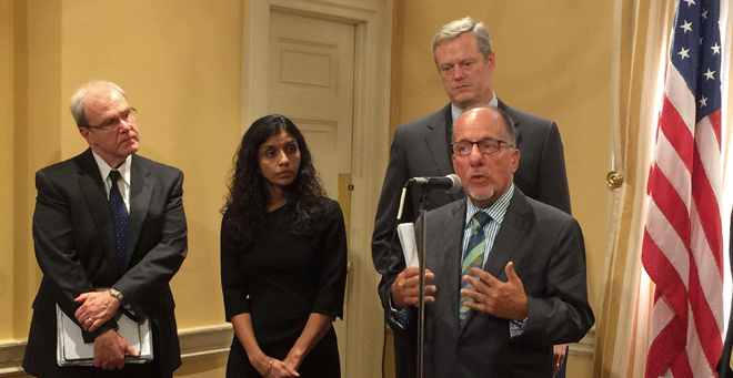 (L-R) UMass Medical School Dean Terence Flotte, MD, Massachusetts DPH Commissioner Monica Bharel, MD, and Massachusetts Gov. Charlie Baker listen as UMMS professor and Massachusetts Medical Scocity President Dennis Dimitri, MD, speaks during a recent press conference on opioid prescribing practices and training.