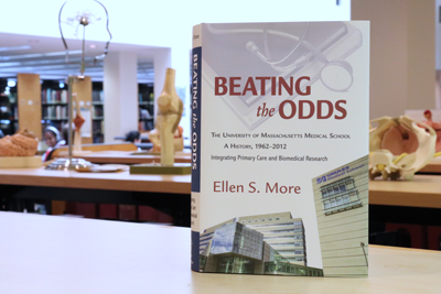 The cover of Beating the Odds: The University of Massachusetts Medical School, A History 1962-2012, by Ellen More, PhD