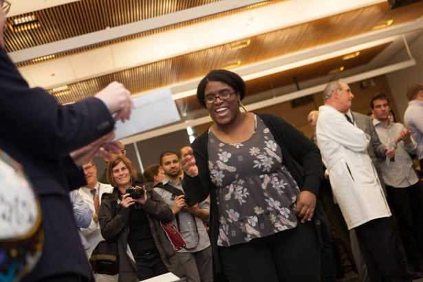 Paula Hercule is all smiles as she receives her envelope. Her residency is in family medicine at Einstein/Montefiore Medical Center in the Bronx.