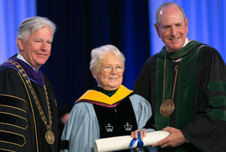 Pincus Medal recipient Patricia Donahoe received an honorary degree at Commencement 2017 from UMass President Marty Meehan (left) and UMMS Chancellor Michael F. Collins.