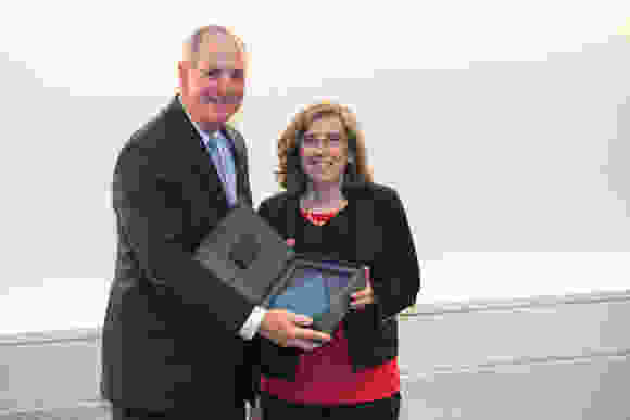 Chancellor Michael Collins and Celia A. Schiffer, PhD, recipient of the Chancellor’s Award for Excellence in Mentoring